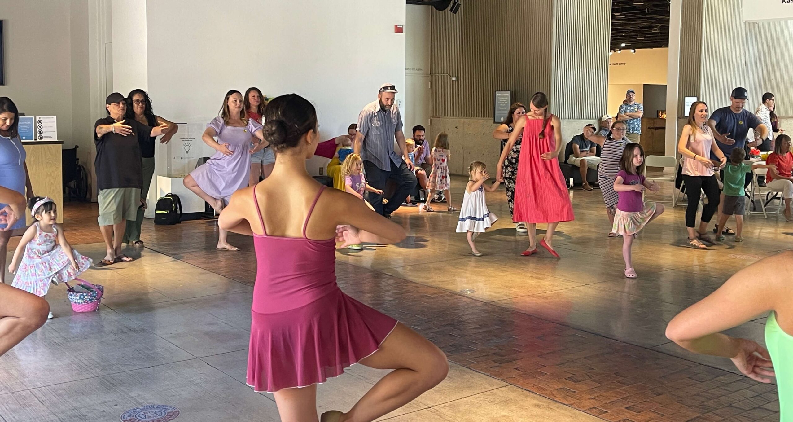 Ballet Tucson dancer teaching a community dance class.