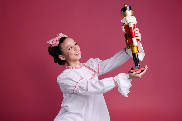 Clara holding a nutcracker